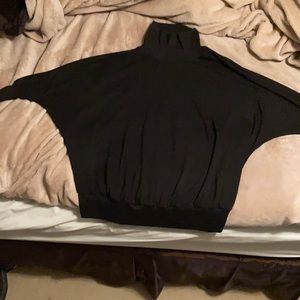 Black sweater worn twice while pregnant and then after. Can wear with jean